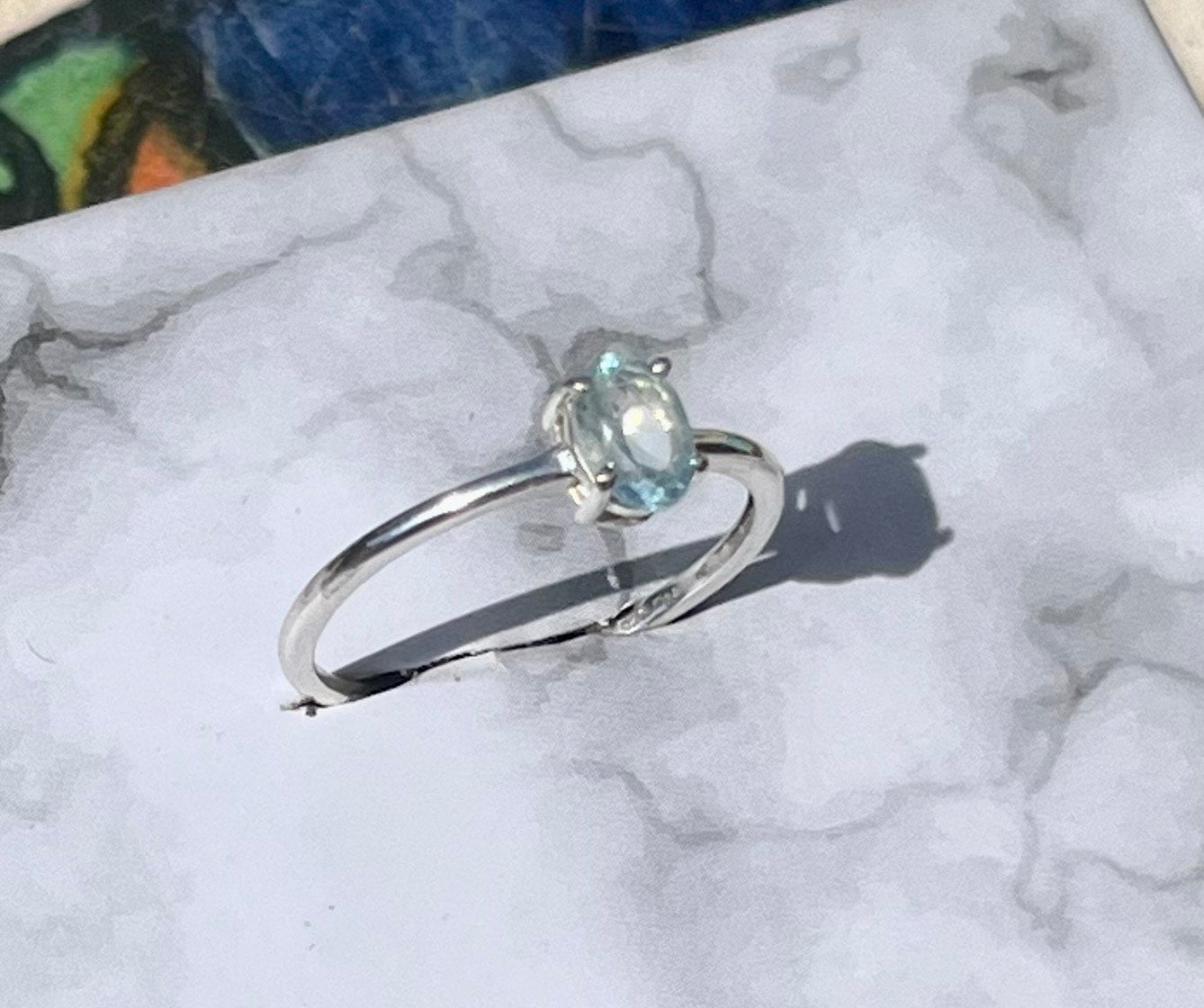 Blue Topaz Oval Solitaire Ring